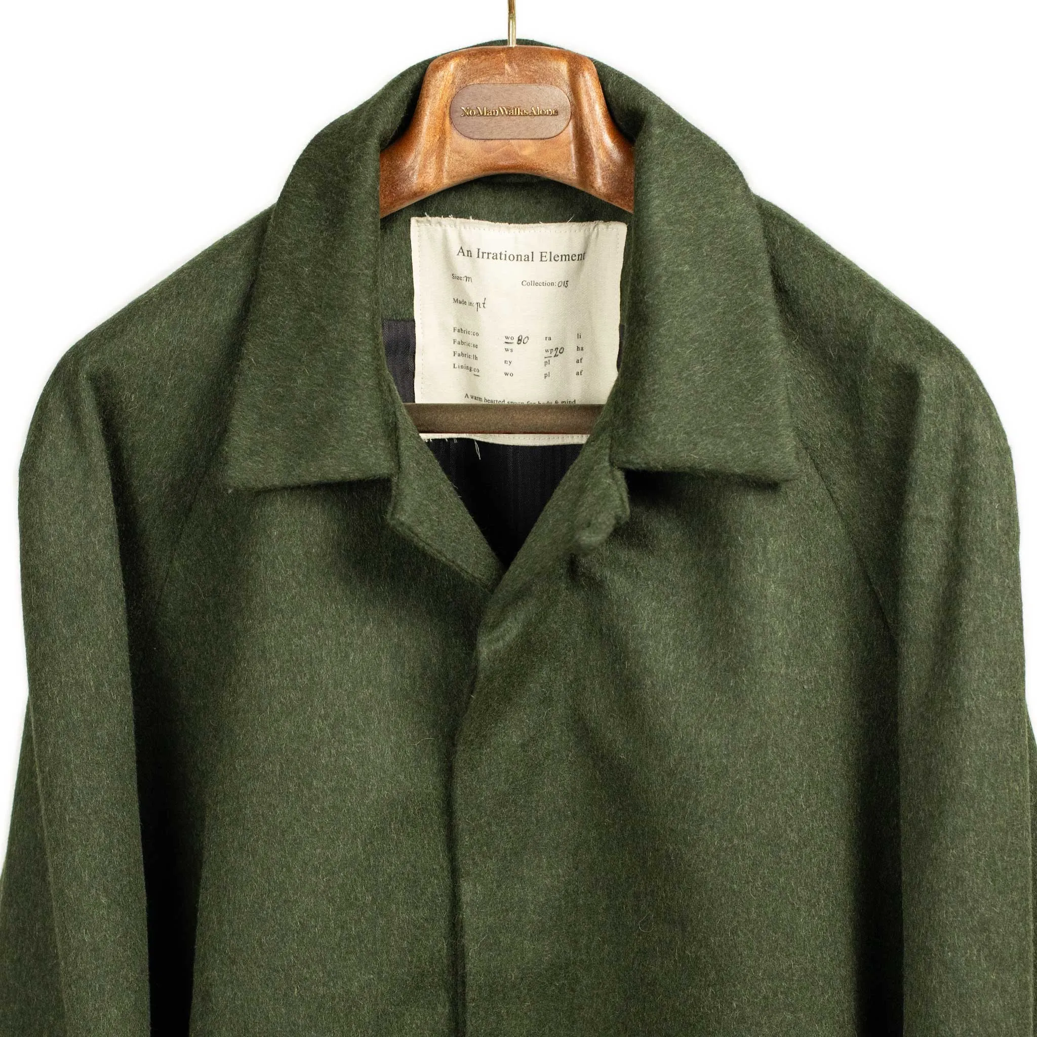 A Coat raglan coat in forest green wool and alpaca