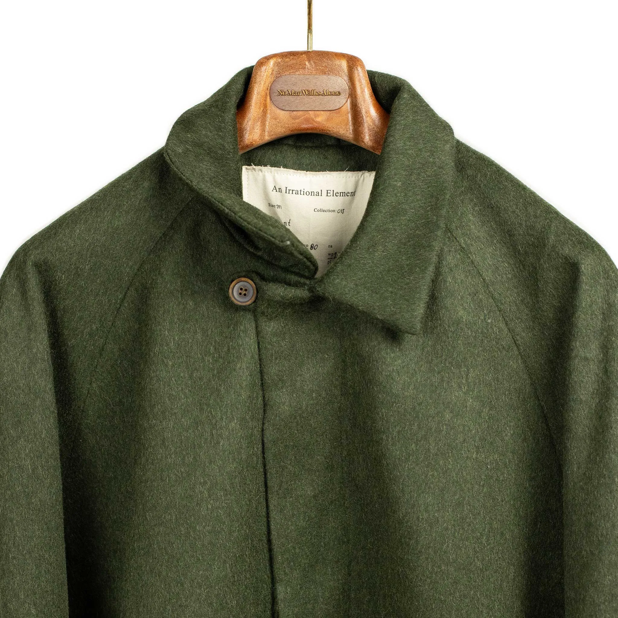 A Coat raglan coat in forest green wool and alpaca